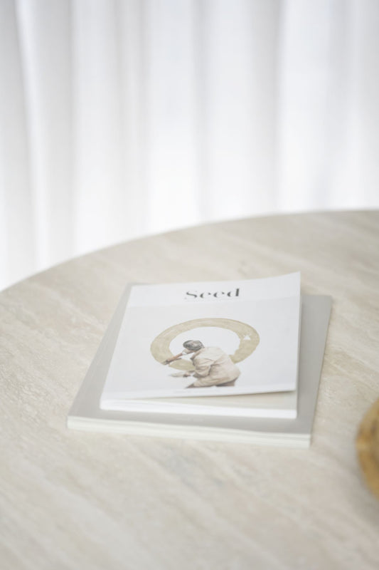 Rowico TARANSAY Round Table, Beige Travertine Top, Brown Legs Ø 125 CM