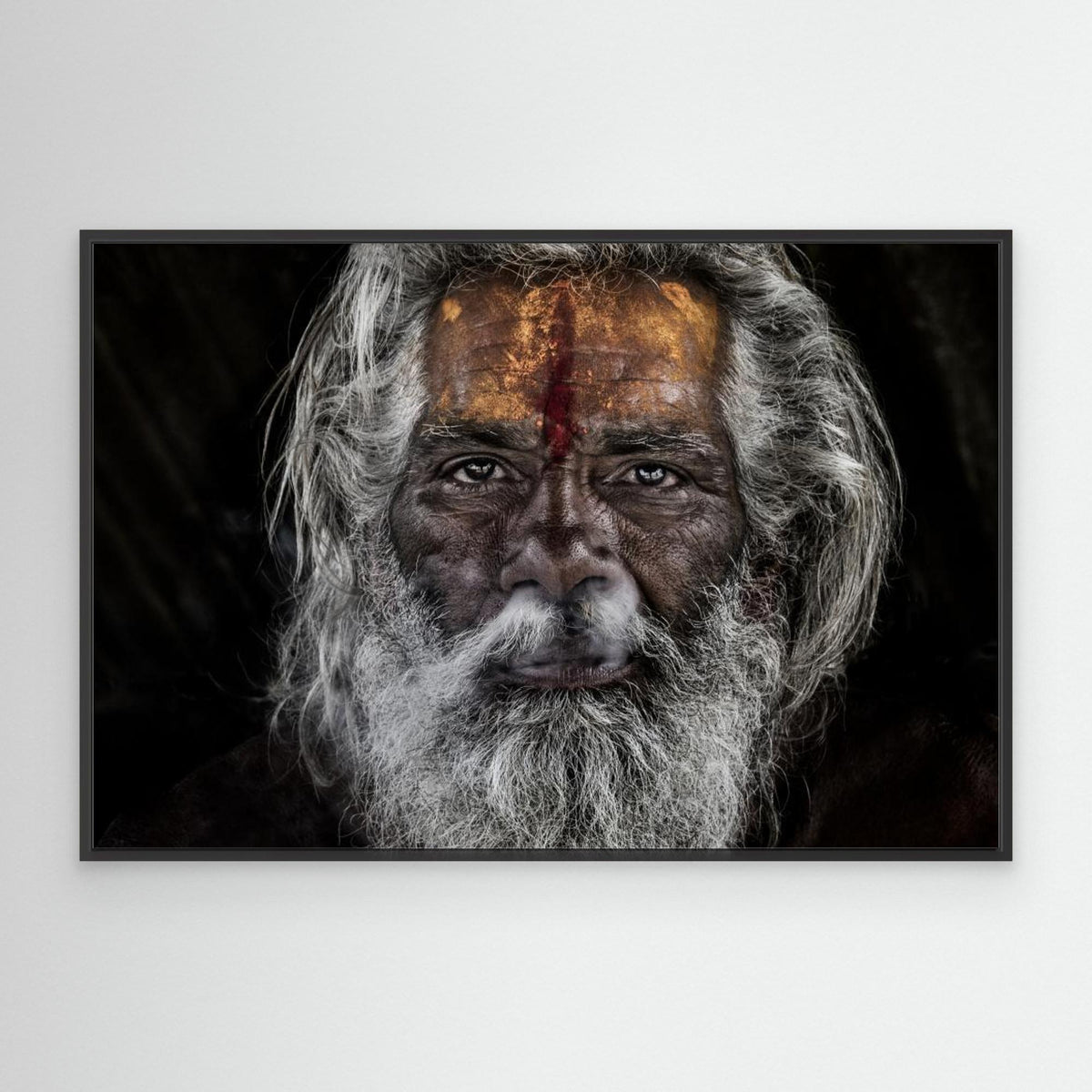Sadhu Cxpelling the Smoke through the Nose - Prayagraj - India by Joxe Inazio Kuesta Garmendia