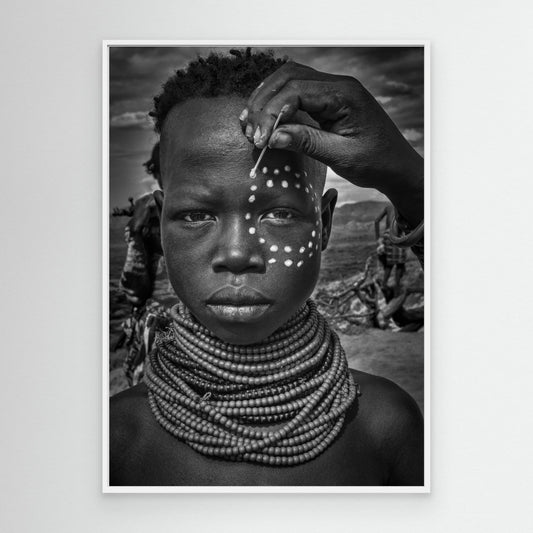 Painting the Face of a Karo Tribe Girl (Omo Valley-Ethiopia) by Joxe Inazio Kuesta Garmendia