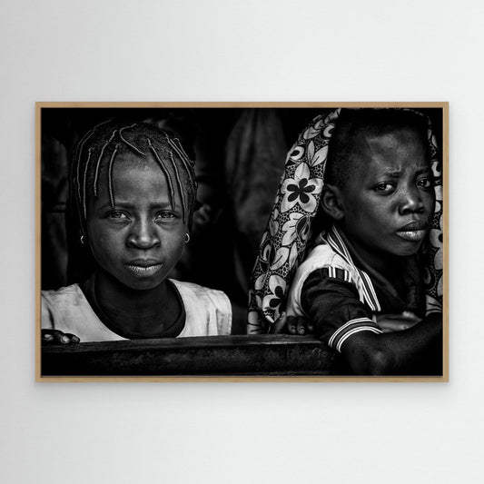 Two girls at school - Benin by Joxe Inazio Kuesta Garmendia