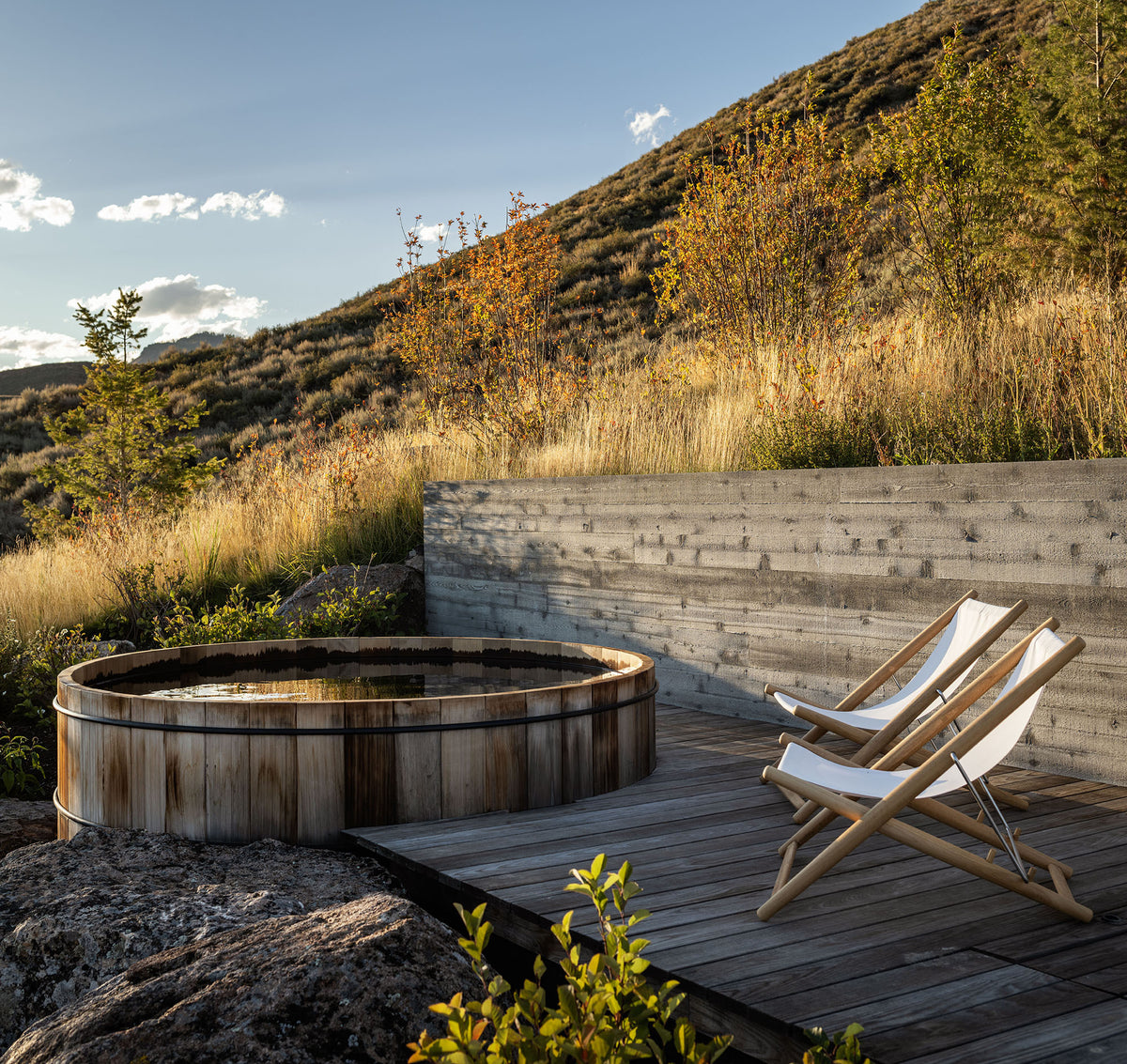 H25 teak lounge chair with a mountain view