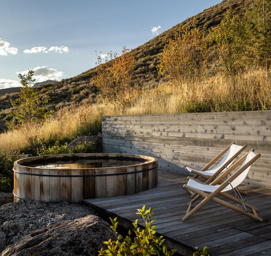 H25 teak lounge chair with a mountain view