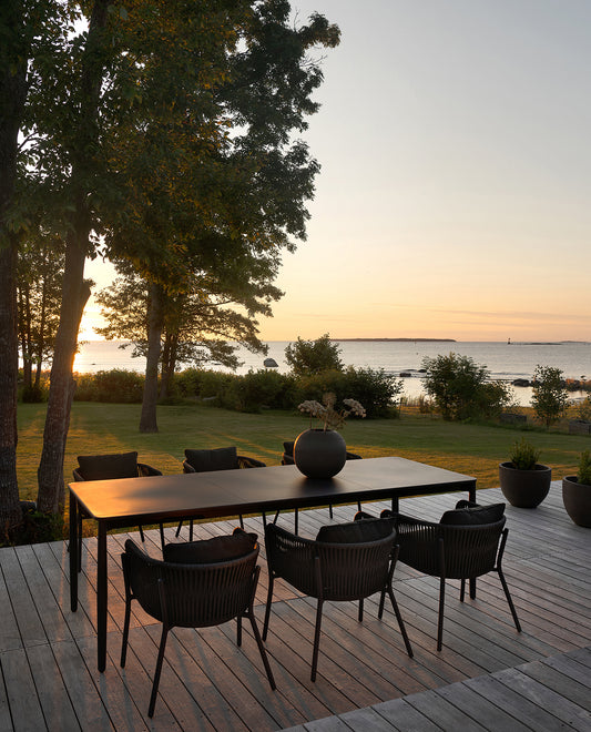 Tira dining set with a sea view