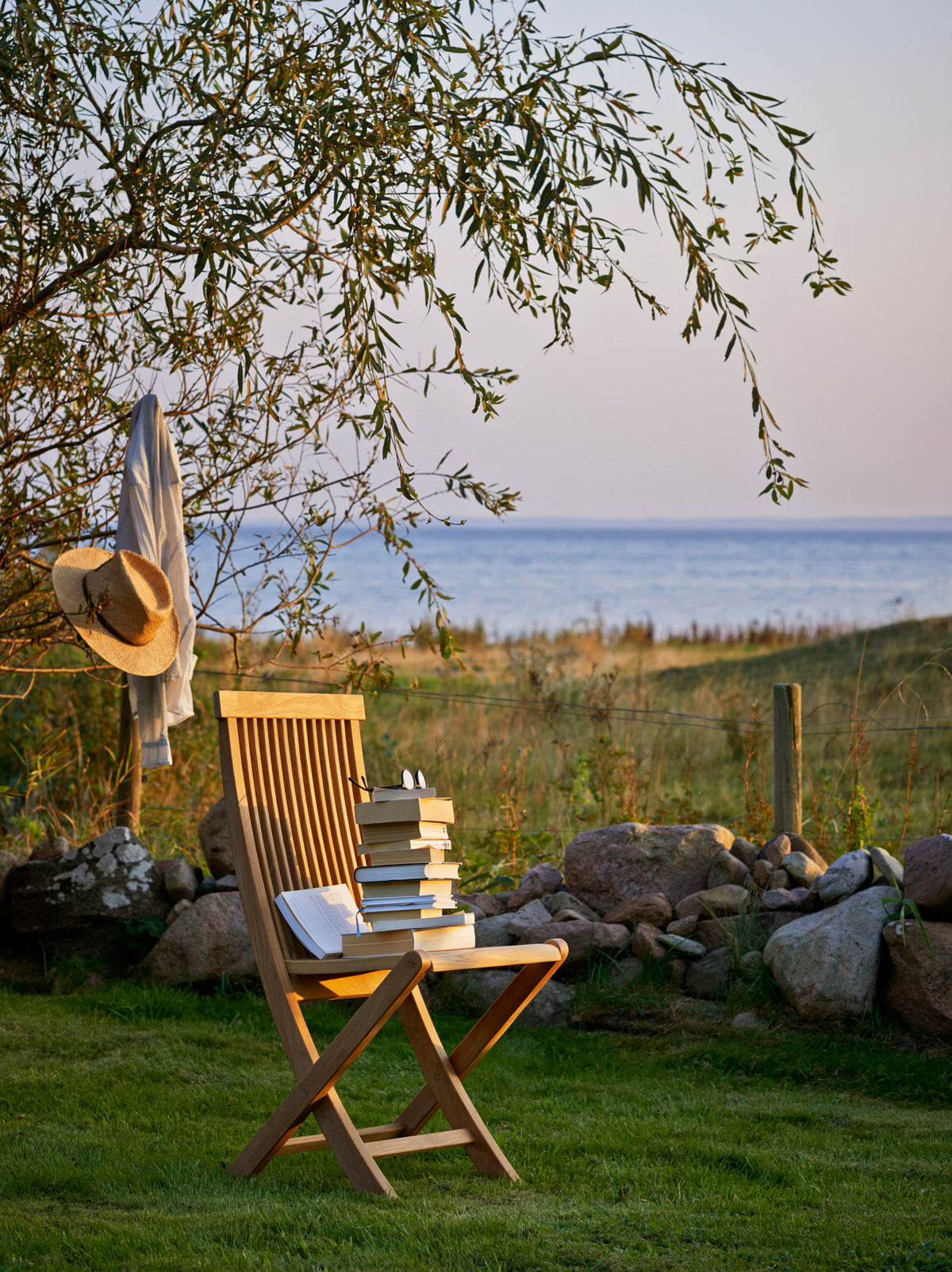Viken teak folding chairs in a setting