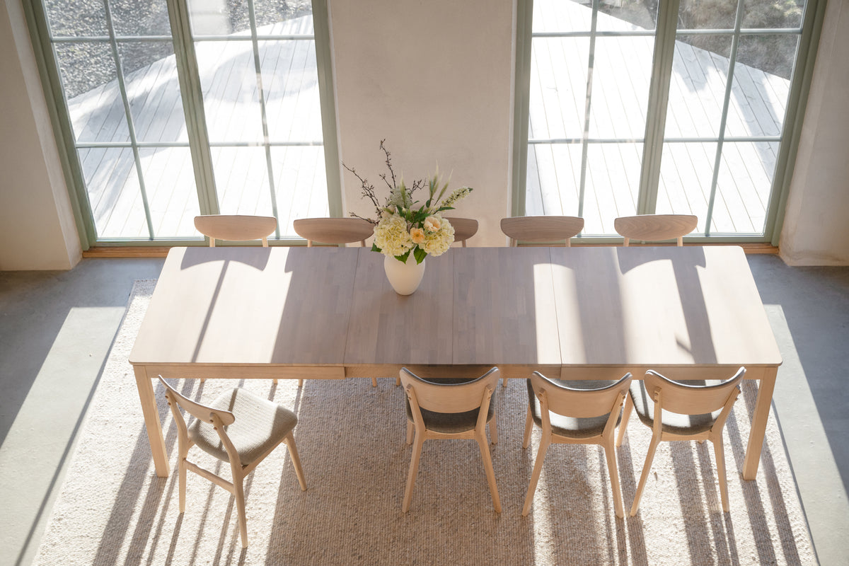 Gardner Dining Table, White Pigmented Oak, 200 to 300 cm – room setting
