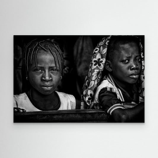 Two girls at school - Benin by Joxe Inazio Kuesta Garmendia